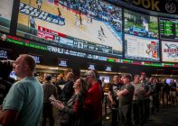 People betting on sports in Vegas