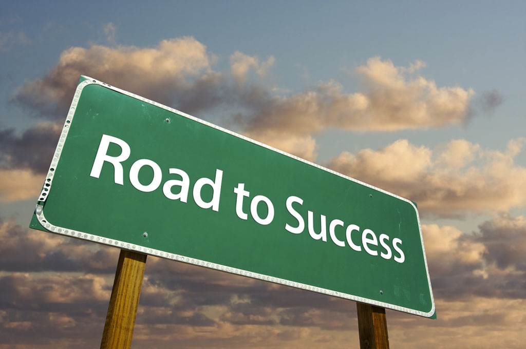 Road to success road sign